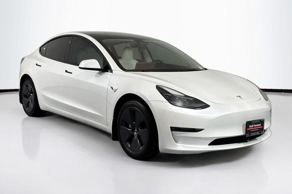 used 2023 Tesla Model 3 car, priced at $27,994