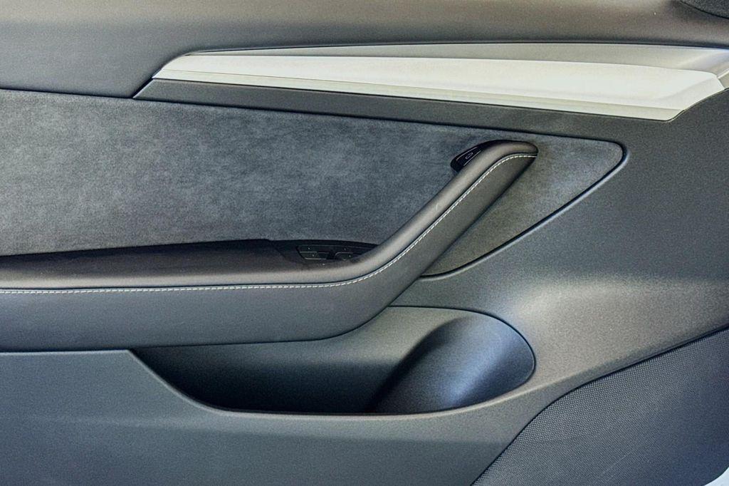 used 2023 Tesla Model 3 car, priced at $27,994