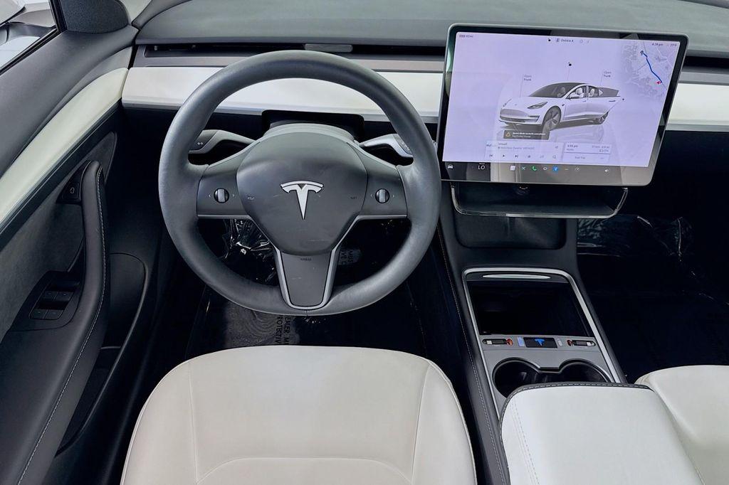 used 2023 Tesla Model 3 car, priced at $27,994