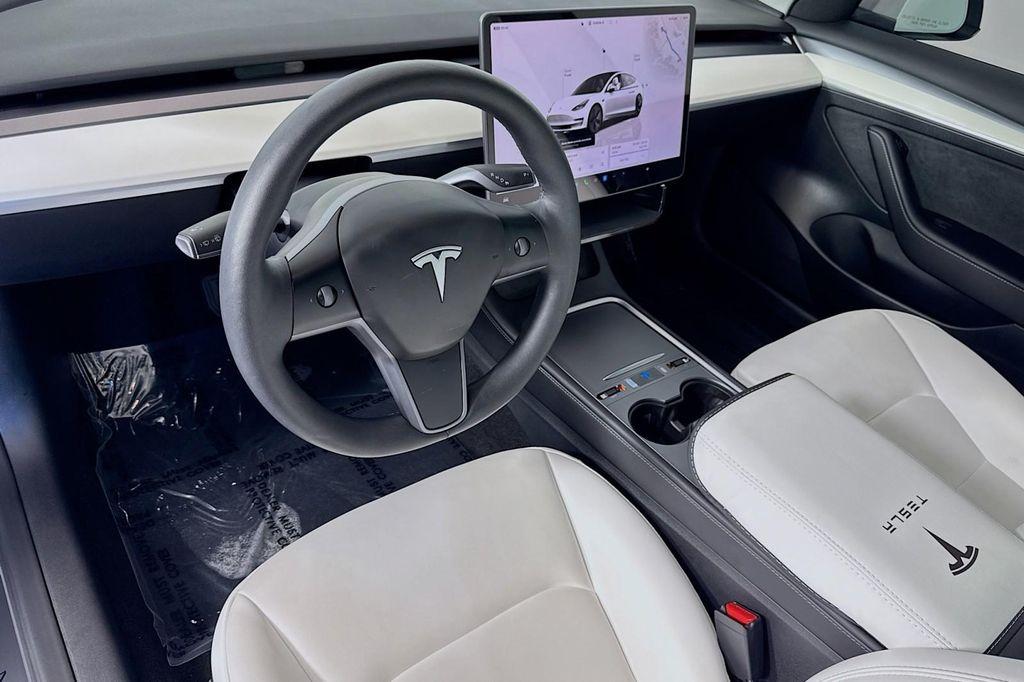 used 2023 Tesla Model 3 car, priced at $27,994