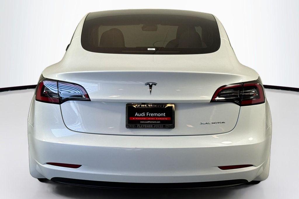 used 2023 Tesla Model 3 car, priced at $27,994