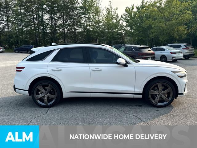 used 2023 Genesis GV70 car, priced at $42,460