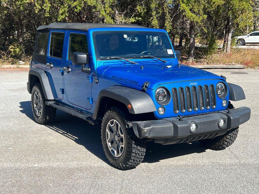 used 2015 Jeep Wrangler Unlimited car, priced at $23,420
