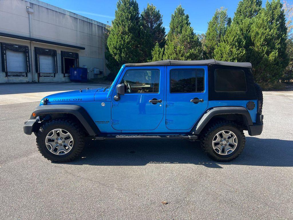 used 2015 Jeep Wrangler Unlimited car, priced at $23,420