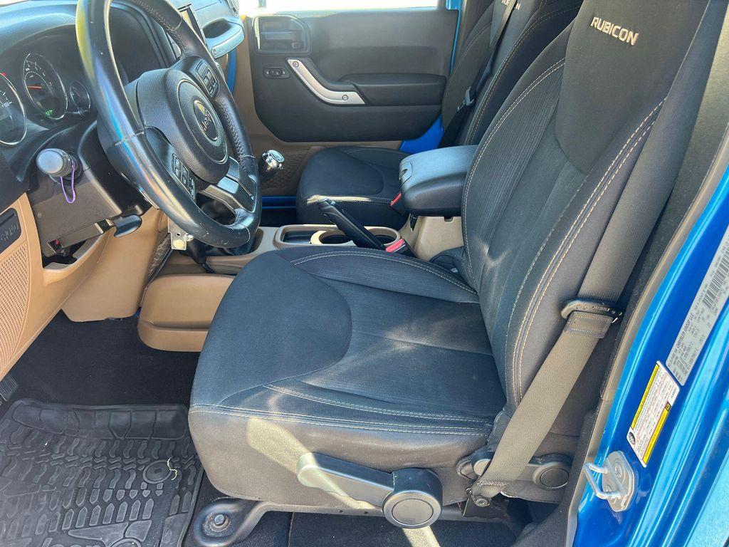 used 2015 Jeep Wrangler Unlimited car, priced at $23,420