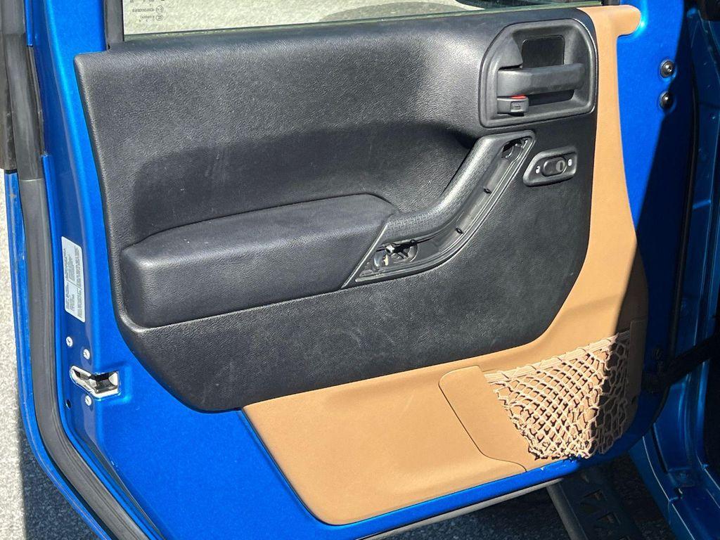 used 2015 Jeep Wrangler Unlimited car, priced at $23,420