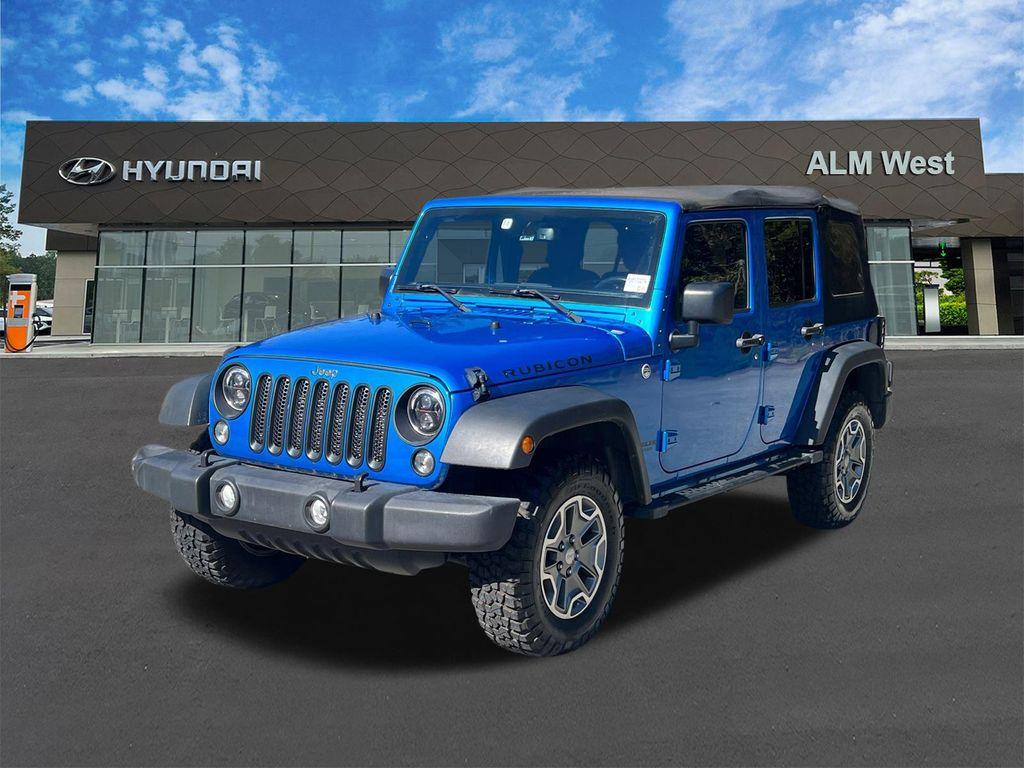 used 2015 Jeep Wrangler Unlimited car, priced at $23,420