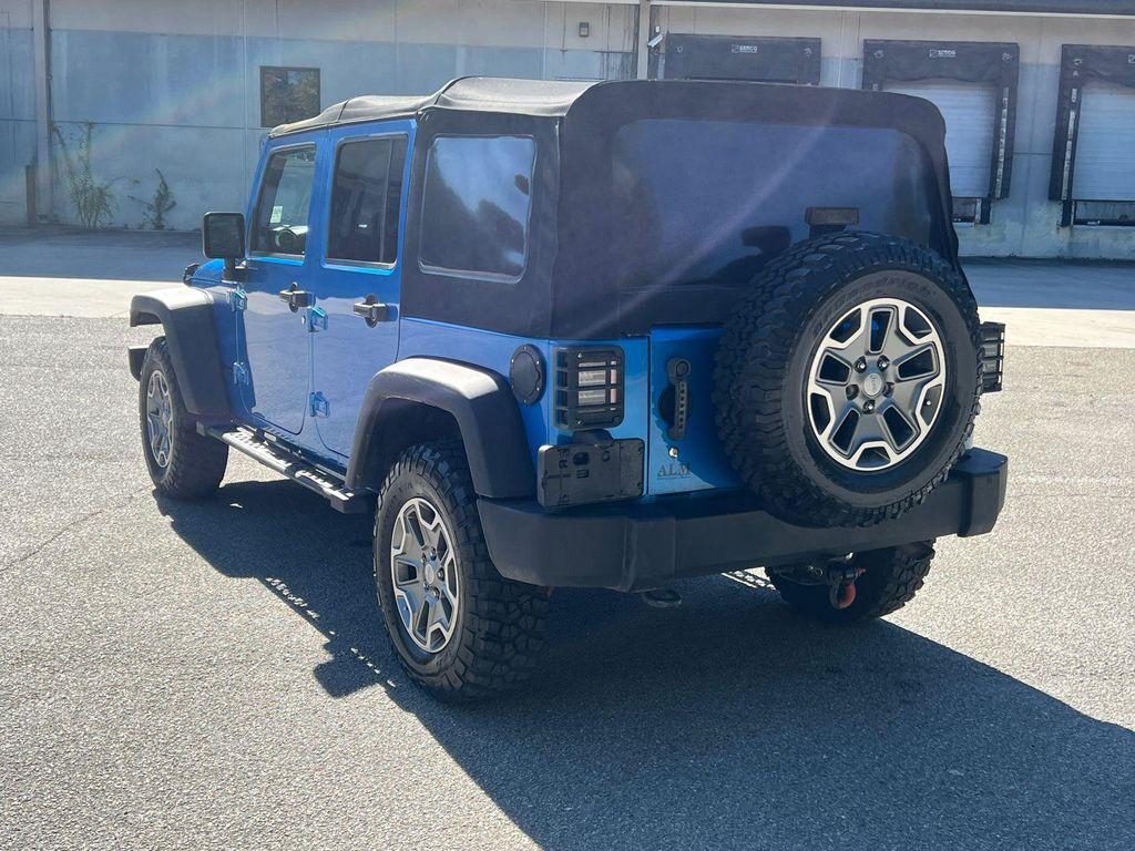 used 2015 Jeep Wrangler Unlimited car, priced at $23,420