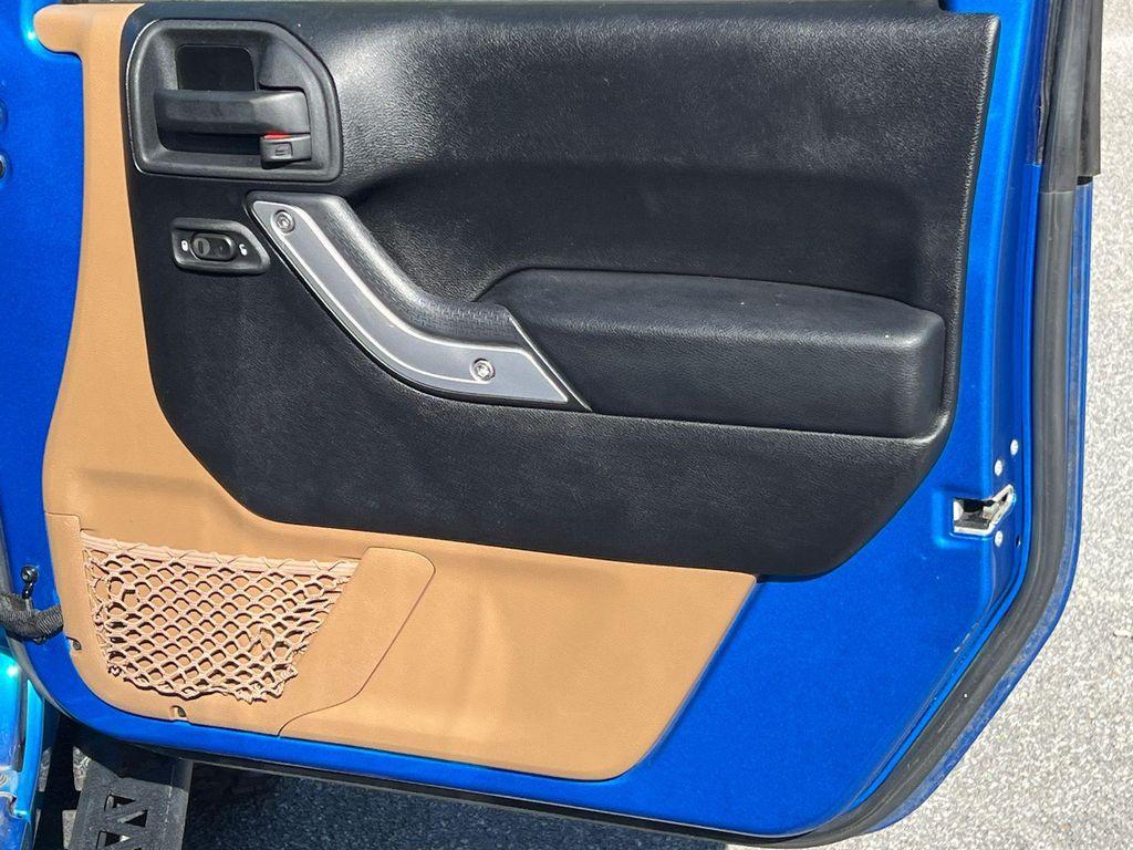 used 2015 Jeep Wrangler Unlimited car, priced at $23,420