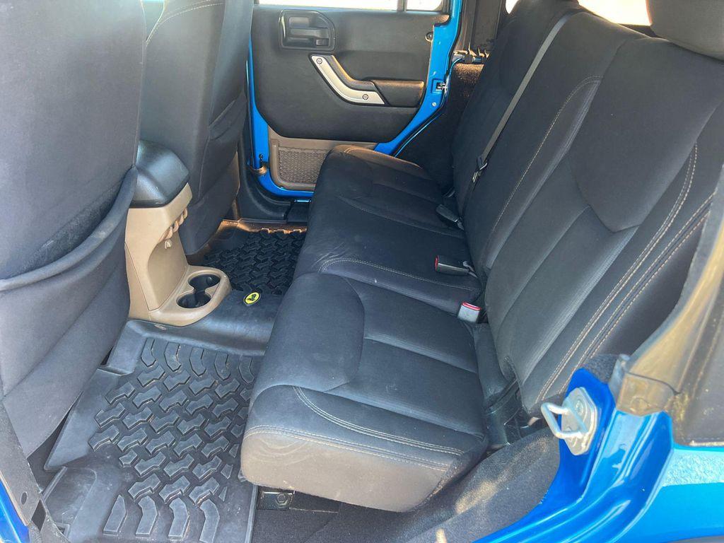 used 2015 Jeep Wrangler Unlimited car, priced at $23,420