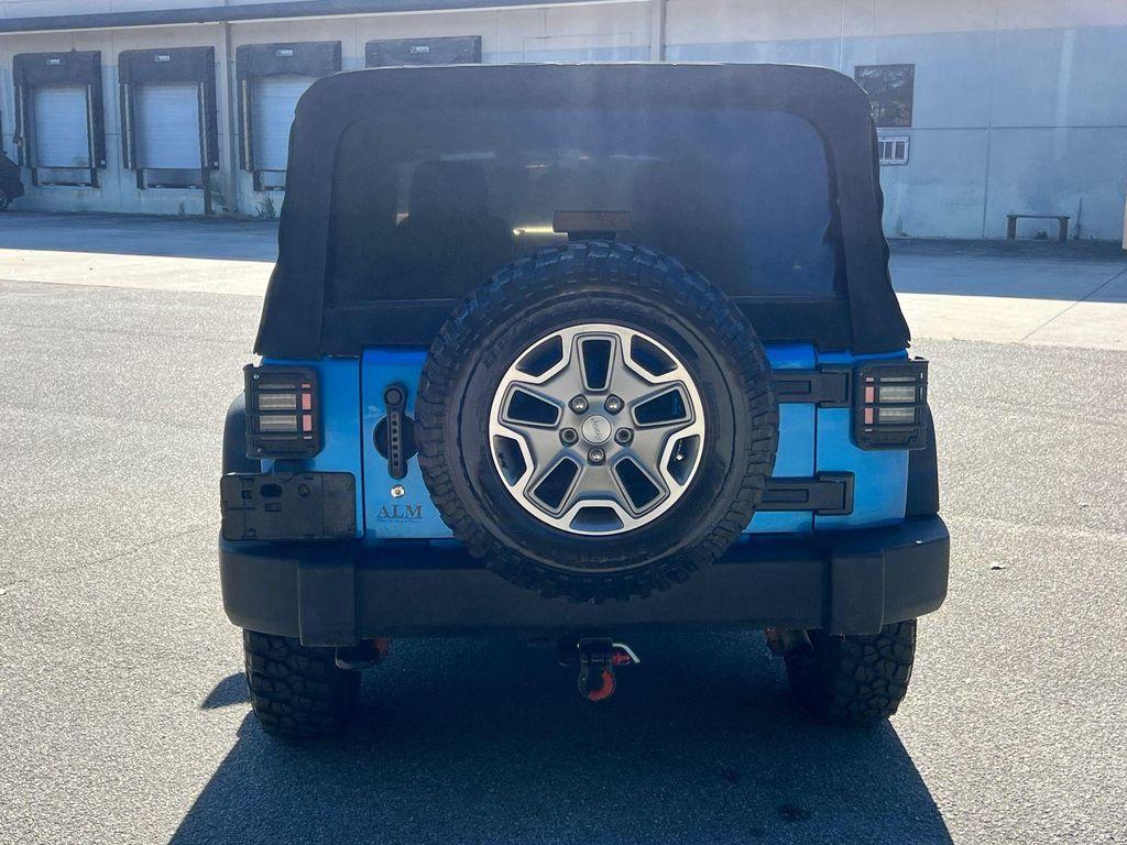 used 2015 Jeep Wrangler Unlimited car, priced at $23,420