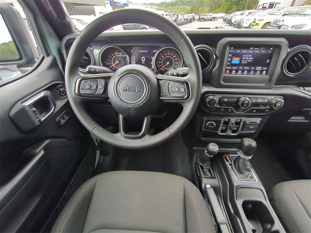 used 2023 Jeep Wrangler car, priced at $28,689