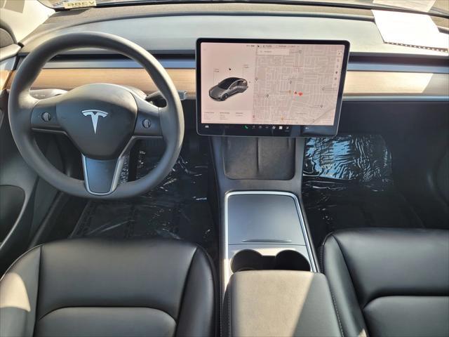 used 2022 Tesla Model 3 car, priced at $29,599