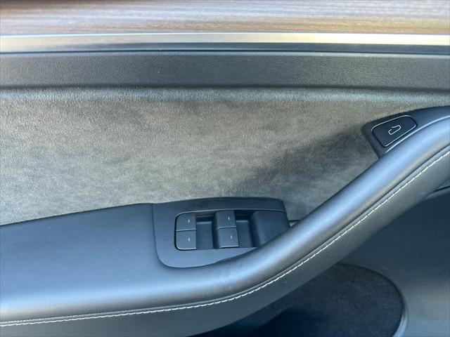 used 2023 Tesla Model Y car, priced at $33,997