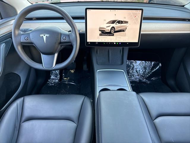 used 2023 Tesla Model Y car, priced at $33,997