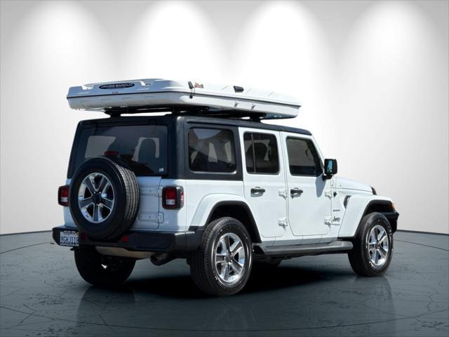 used 2021 Jeep Wrangler Unlimited car, priced at $27,599