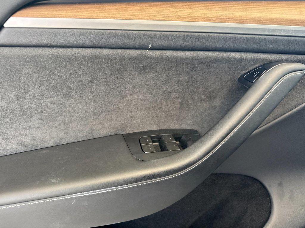 used 2023 Tesla Model Y car, priced at $31,900