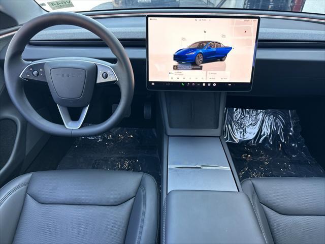 used 2025 Tesla Model 3 car, priced at $38,999