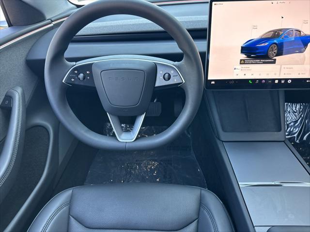 used 2025 Tesla Model 3 car, priced at $38,999