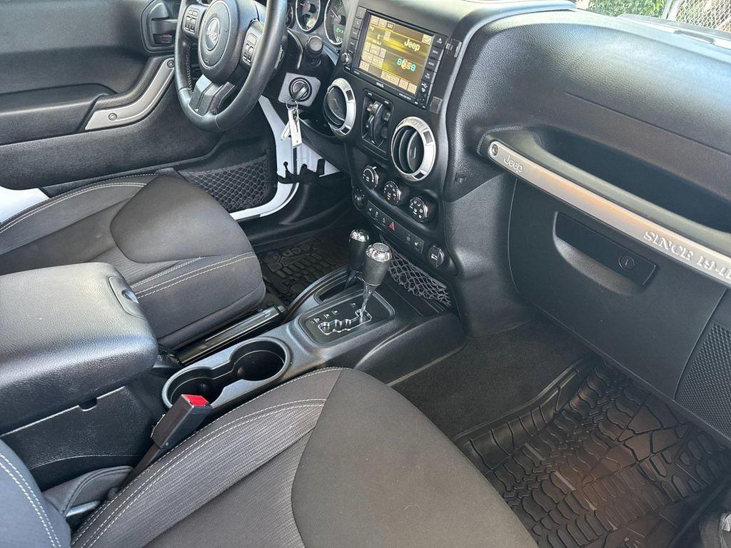 used 2015 Jeep Wrangler Unlimited car, priced at $19,994