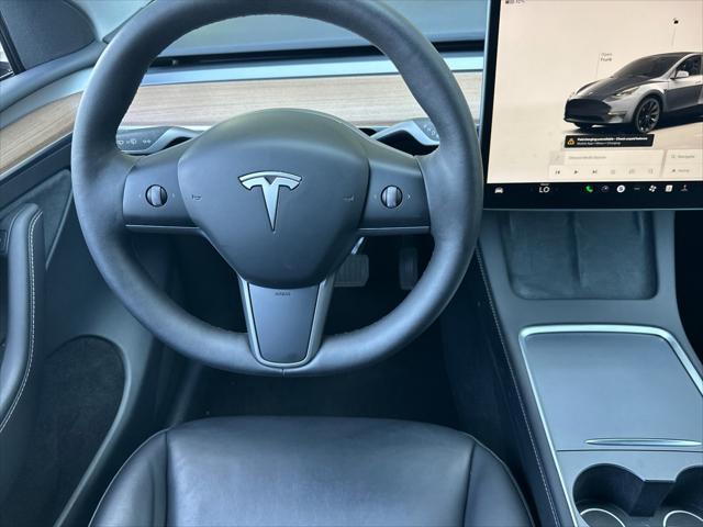 used 2023 Tesla Model Y car, priced at $34,997