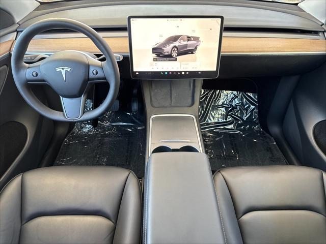 used 2023 Tesla Model Y car, priced at $33,997