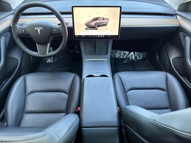 used 2023 Tesla Model 3 car, priced at $27,899
