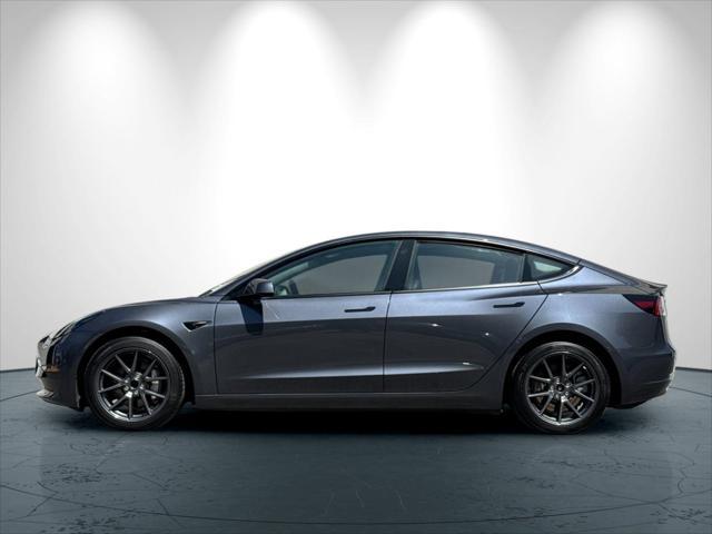 used 2023 Tesla Model 3 car, priced at $27,899