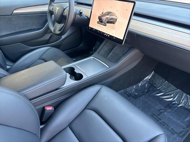 used 2023 Tesla Model 3 car, priced at $27,899