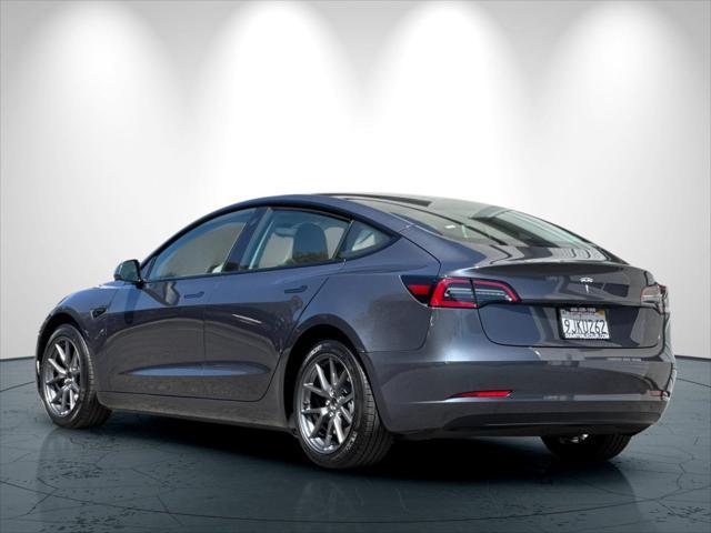 used 2023 Tesla Model 3 car, priced at $27,899