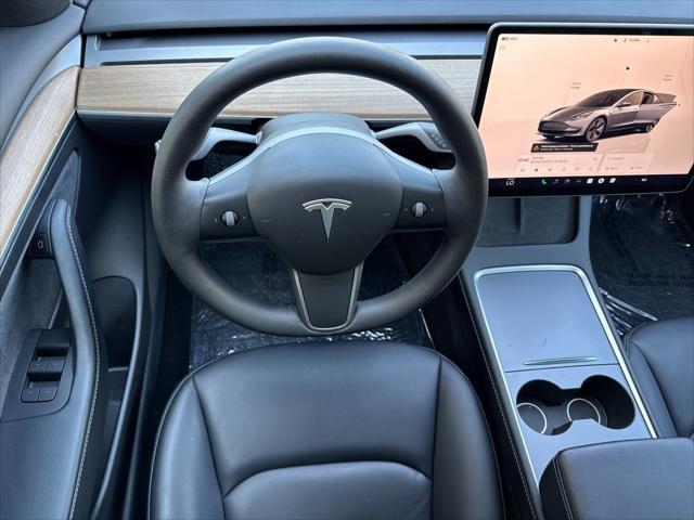 used 2023 Tesla Model 3 car, priced at $27,899