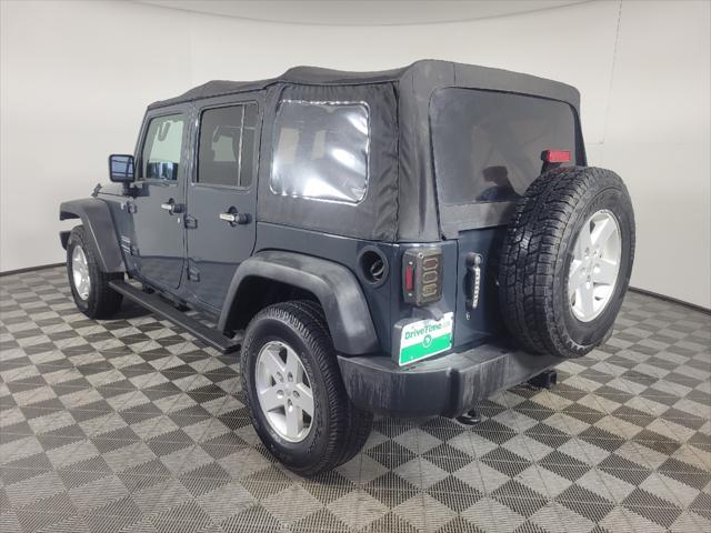 used 2018 Jeep Wrangler JK Unlimited car, priced at $26,395
