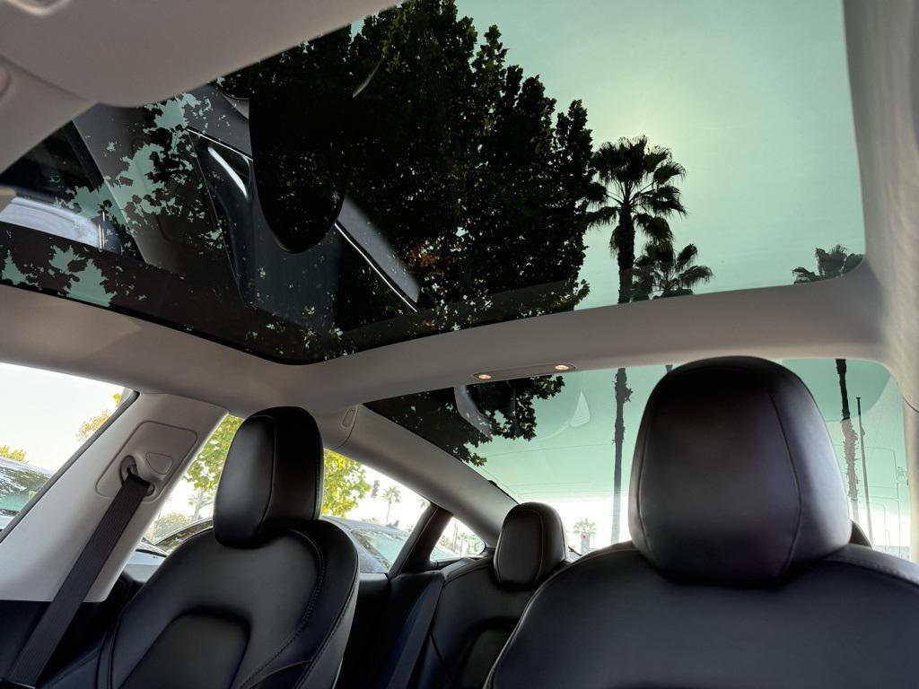 used 2018 Tesla Model 3 car, priced at $27,000