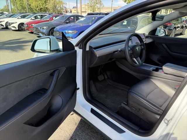 used 2022 Tesla Model Y car, priced at $27,998