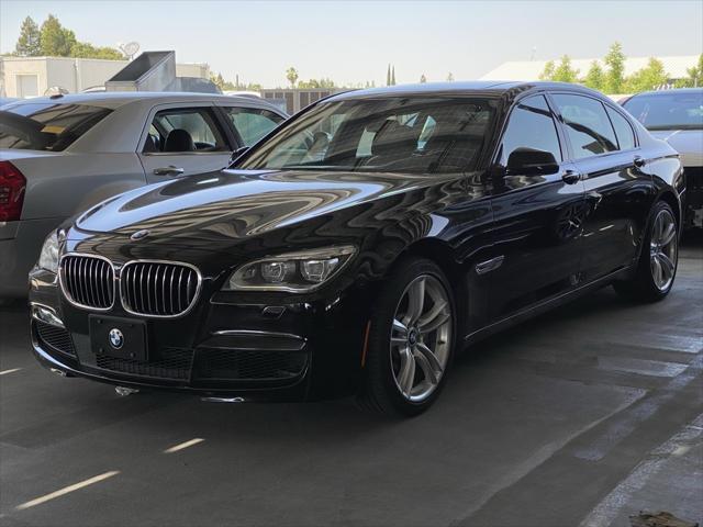 used 2015 BMW 750 car, priced at $26,991
