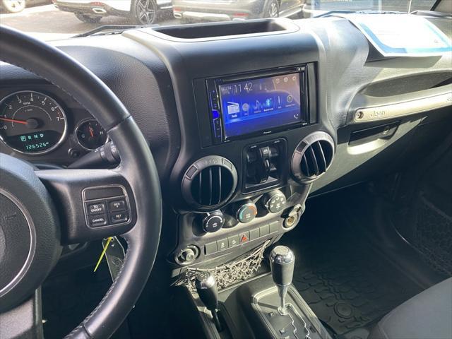 used 2016 Jeep Wrangler Unlimited car, priced at $16,988