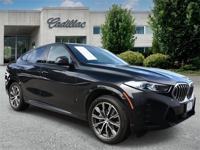 used 2024 BMW X6 car, priced at $59,900