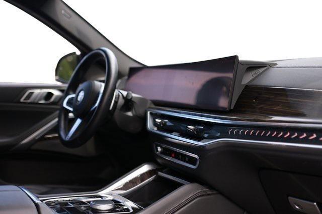 used 2024 BMW X6 car, priced at $59,900