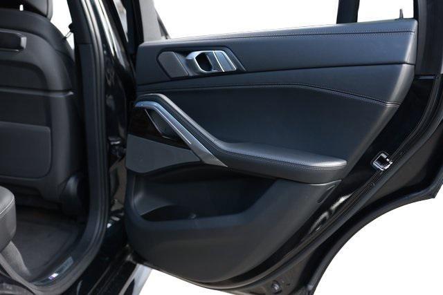 used 2024 BMW X6 car, priced at $59,900