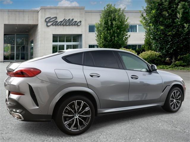 used 2024 BMW X6 car, priced at $59,900
