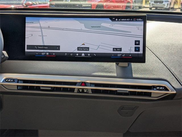 new 2026 BMW iX car, priced at $89,275