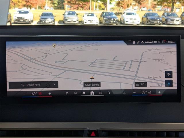 new 2026 BMW iX car, priced at $89,275