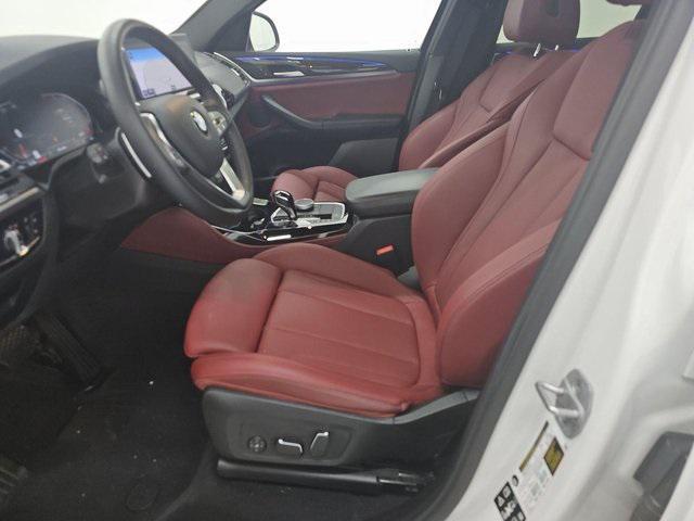 used 2025 BMW X4 car, priced at $47,031