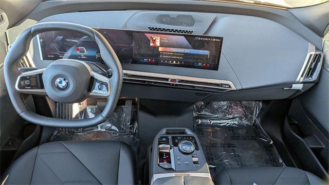 new 2026 BMW iX car, priced at $96,225