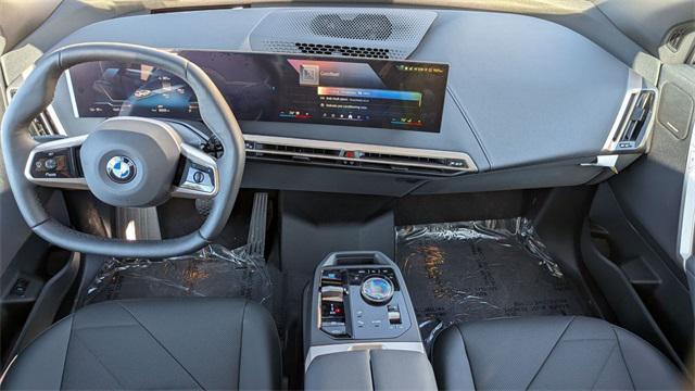 new 2026 BMW iX car, priced at $96,225