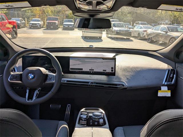 new 2026 BMW iX car, priced at $103,565