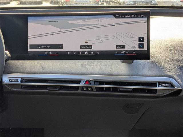 new 2026 BMW iX car, priced at $103,565