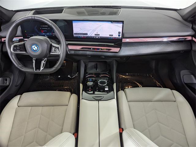 used 2025 BMW i5 car, priced at $57,406