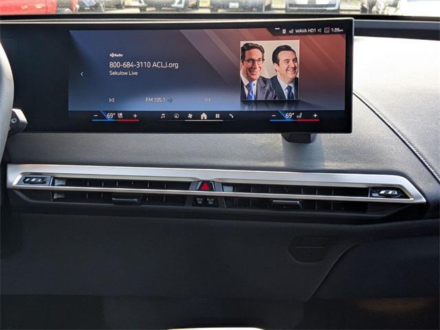 new 2026 BMW iX car, priced at $94,175