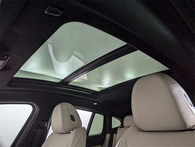 used 2021 BMW X4 car, priced at $38,216